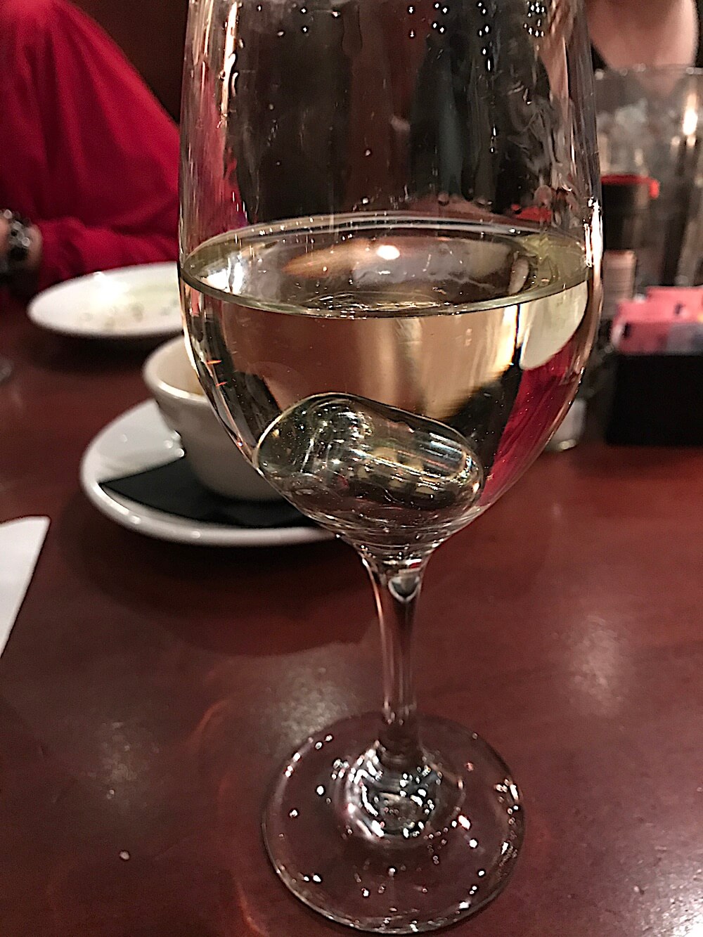The wine was served with frozen stainless steel cubes to keep it cold without diluting it. Great idea!