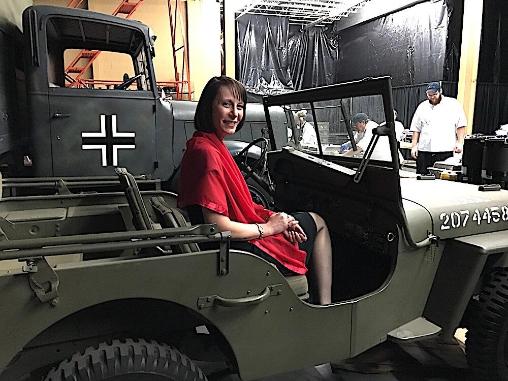 Rachel Ford, executive director of the Knoxville Symphony Orchestra, relaxed in a German jeep during Richard and Bette Bryan's New Year's Eve party. Cheers!