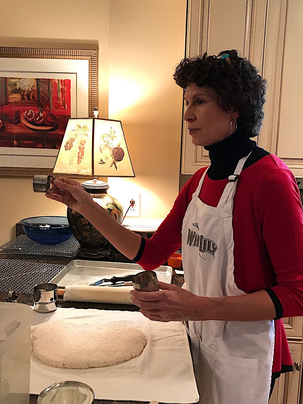 Gently roll the dough with a rolling pin until it is about 1/2 to 3/4-inch thick and cut it into rounds with a sharp, straight-sided biscuit cutter.