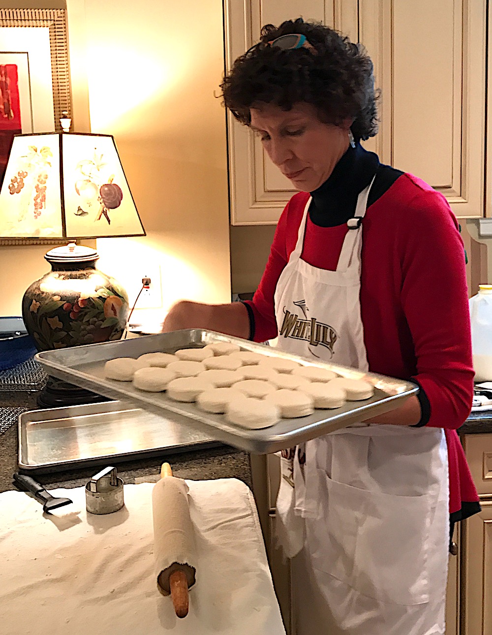 Gently roll the dough with a rolling pin until it is about 1/2 to 3/4-inch thick and cut it into rounds with a sharp, straight-sided biscuit cutter.