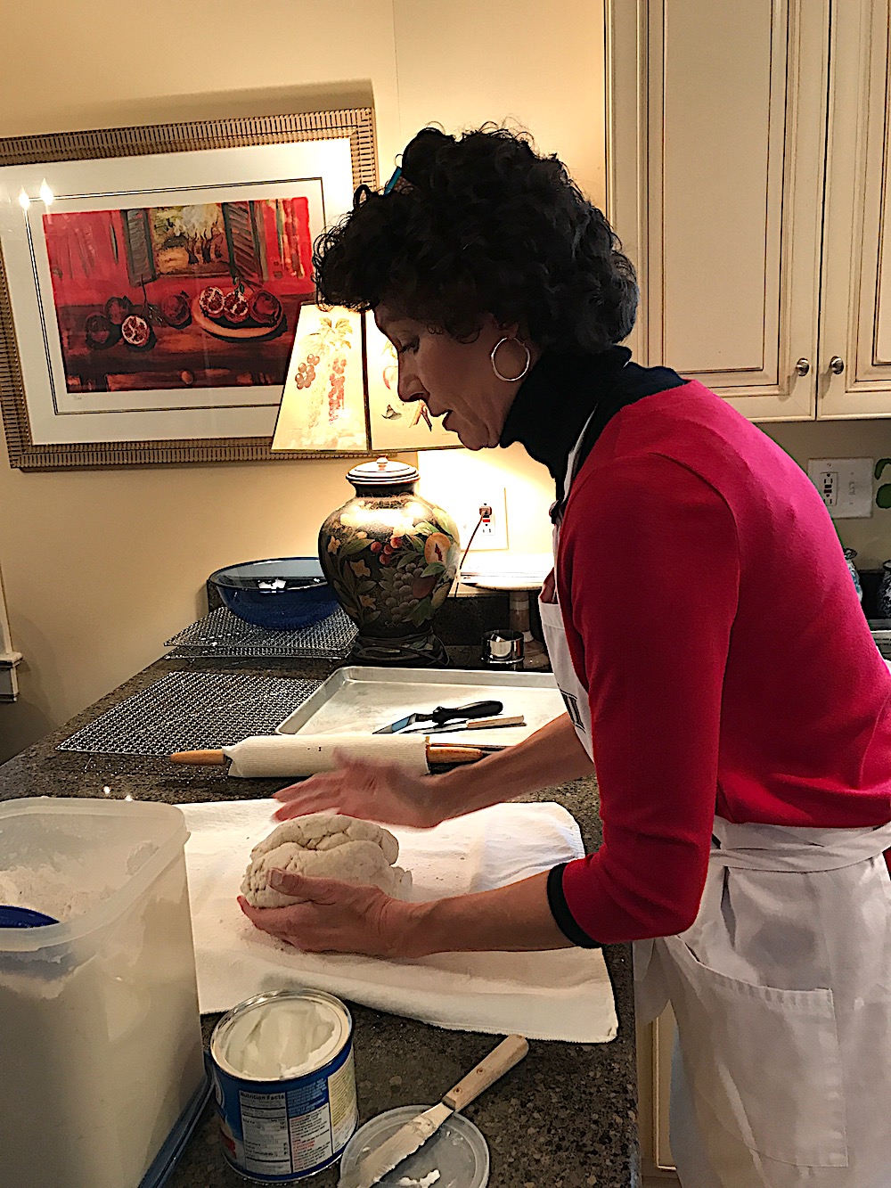 Turn the dough out onto a floured pastry cloth (or counter top) and fold it over a few times until it is smooth. Again, use a gentle touch. You are not trying to knead it as you would a loaf of bread.