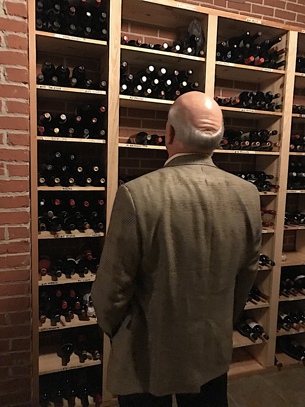 Bruce Anderson checks out some of the wine.