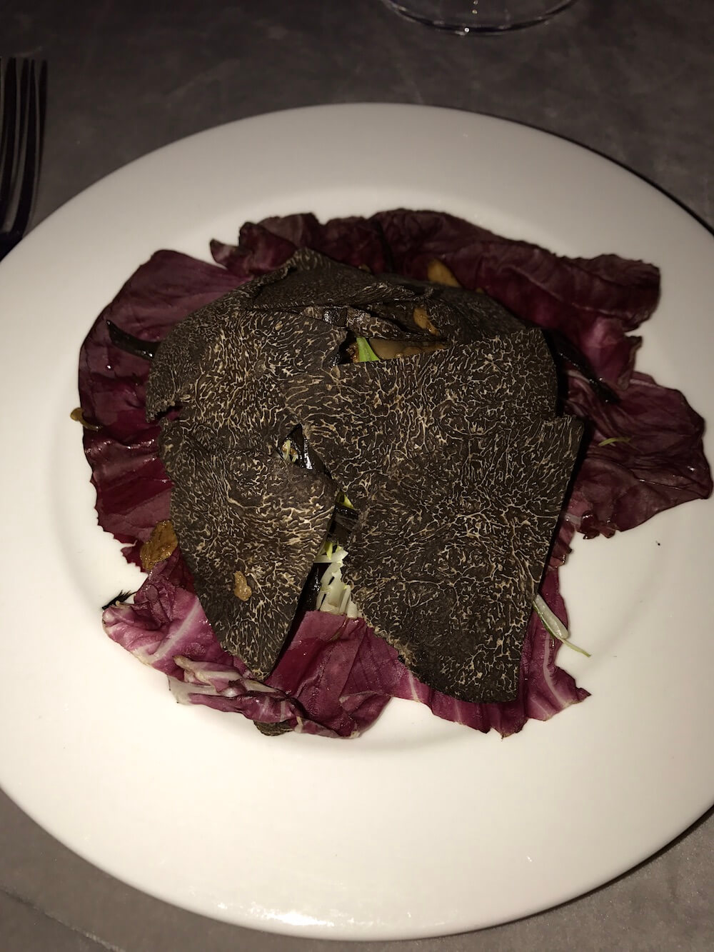 The salad course featured black truffles, radicchio leaves, Frisee, mushrooms and black truffle vinaigrette. It was delicious. (How could it not be with all those truffles?)