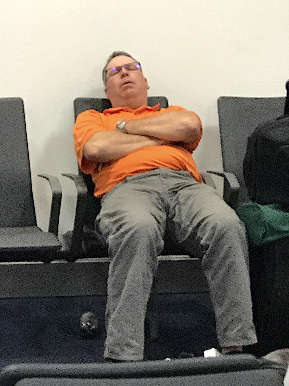 A chair sleeper in the Atlanta airport. (Photo by Cynthia Moxley)