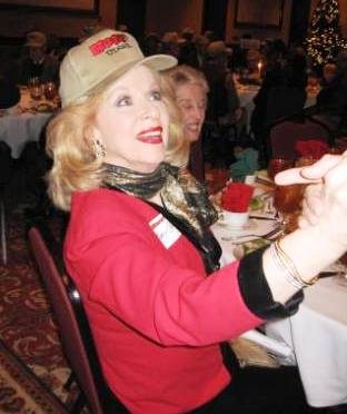 Gosh, who looks good in a baseball cap? Mary Costa, of course!