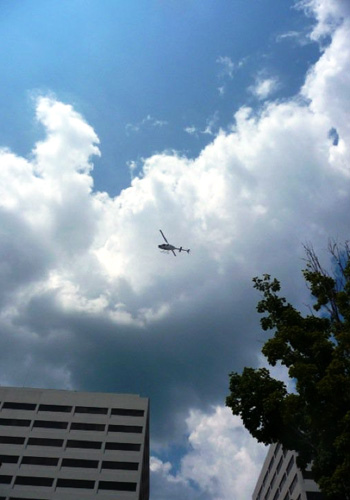 chopper A police helicopter hovered over downtown.