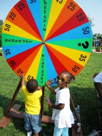 game Games such as this one at the Mercy Health booth entertained the students as they waited their turn to pick up shoes.