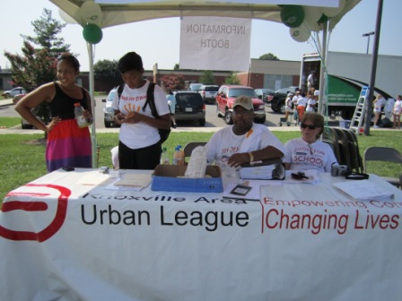 urbanleaguebooth1 The Urban League booth was staffed by Qiana Hardy, standing, a member of the Urban League Young Professionals, Aaron Kyle and Brenda Roper, both Urban League staff members.