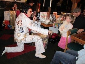 elvis-on-knee He had all the moves!