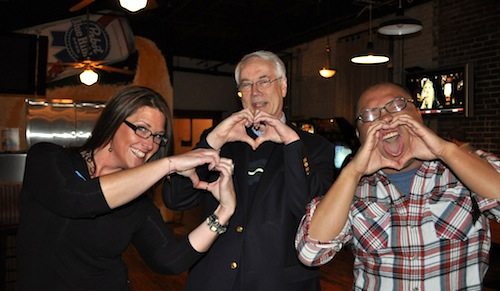 221436_1911628142799_1004731633_2189282_1257252_o Erin, Alan and Saul Young of the News Sentinel giving the "Show Us Where Your Heart is" sign.