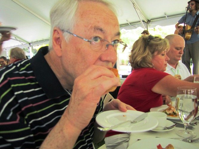 alan-eats-another-biscuit First up: biscuits with pork tenderloin from Benton's Country Hams and plain biscuits with two kinds of jam for spreading.