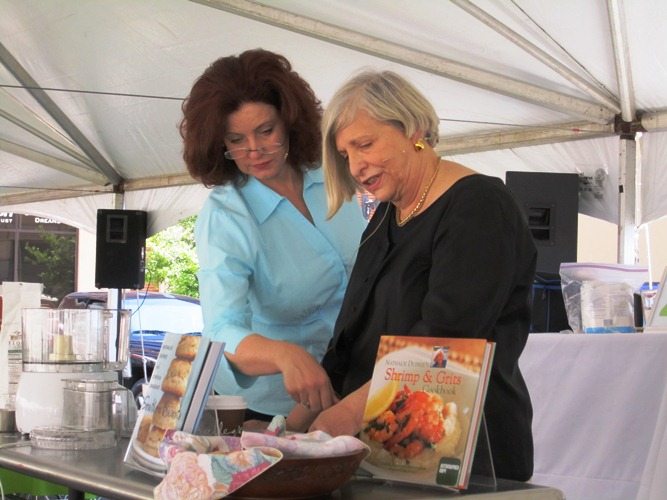 natalie-and-co-author Nathalie Dupree, right, and her co-author Cynthia Graubart, preparing for a demontration. Dupress confessed that she had smuggled a convection oven into her hotel room at the Hotel Oliver on Market Square!