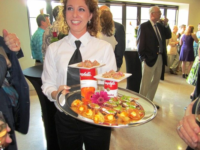 server-with-soup-cans The reception, held upstairs, had a kind of Andy Warhol theme. Thus the soup cans on the appetizer tray.