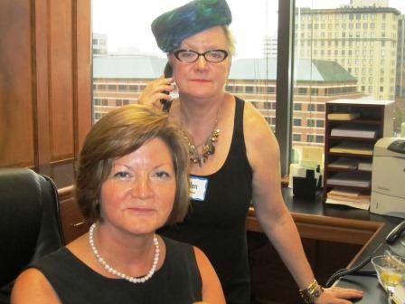 front-desk-girls Two of our hosts, Melinda Meador, left, and Ellen Robinson looked the part of front desk girls at a Sterling Cooper cocktail party!