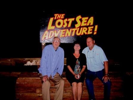 lost-sea-photo-op Alan Carmichael, left, joins Tess and Jimmy for a photo op deep underground when we get out of the boat.