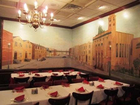mural-at-genes This famous two-wall mural is said to depict owner Tony Durpetti's old neighborhood. It features himself as a 7-year-old boy.