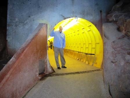 yellow-tunnel You access the caves via a big yellow tunnel. This is Alan on the way out.