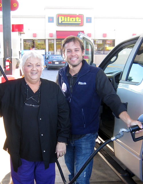 jack-ryan-annette-miller2 WIVK's Jack Ryan pumps gas for customer Annette Miller at the PIlot on John Sevier Highway.