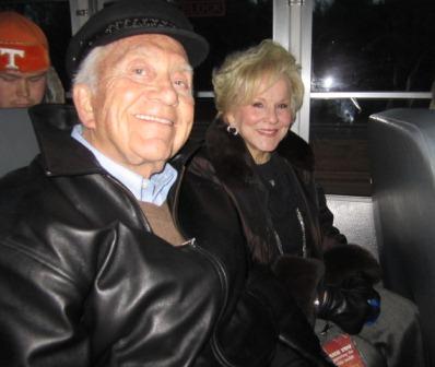 bill-and-janet-on-bus You had to take a shuttle bus to get to the VIP tent. Here are Bill Regas and Janet Crossley on that bus.