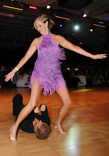 dancing-stinnett Renita Stinnett, sales and event planner for the Knoxville Expo Center, with her professional dance partner, Mark Becker.