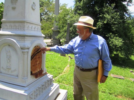 secret-stash Steve points out the secret panel on the Shepard monument.