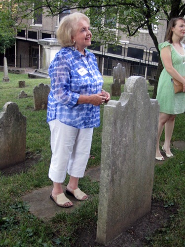 dawn-listening Dawn Ford, standing of James White's grave, was one of the attendees.