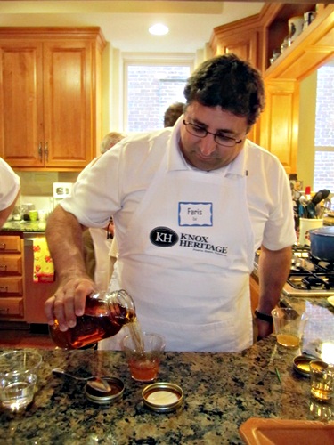 faris-makes-drink Host Faris Eid pours moonshine into the punch! Whoo-hoo!