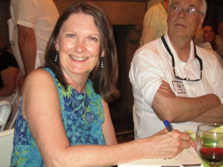 gay-signs-book Gay Lyons took a few moments to sign the Knox Heritage Summer Suppers Cookbook, which she authored.