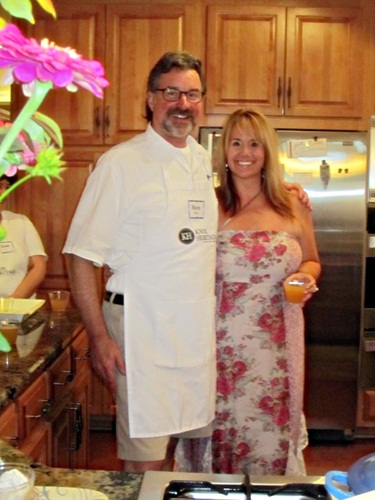 wayne-and-kristin Host Wayne Blasius poses with Kristin Grove in the Andersons' kitchen. Kristin lives at The Glencoe, too.