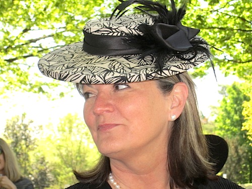 melinda-tries-on-hat I hope Melinda bought this one because she looks great in it!