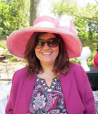 shaun-in-hat Shaun Fulco, the CFO of Moxley Carmichael, tried on this great pink hat. She is looking for a hat to wear for her outdoor June wedding to Roger Hyver.