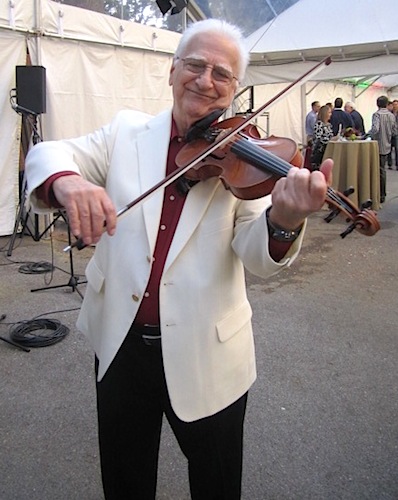 al-columbo Strolling violinist Al Columbo added an Old World feel to Dogwood After Dark.