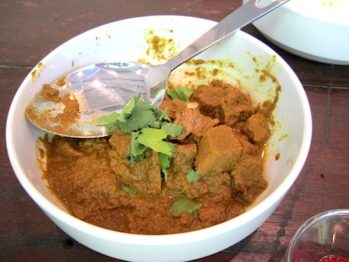 beef Indonesian beef rendang was the spiciest dish we had. It was so spicy, it was served with raita, a cucumber/yogurt sauce designed to moderate its heat.