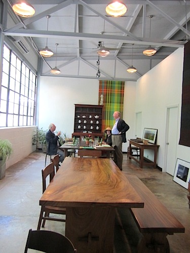 first-arrivals The Emorys maintained the industrial look of the building, including the high ceilings.