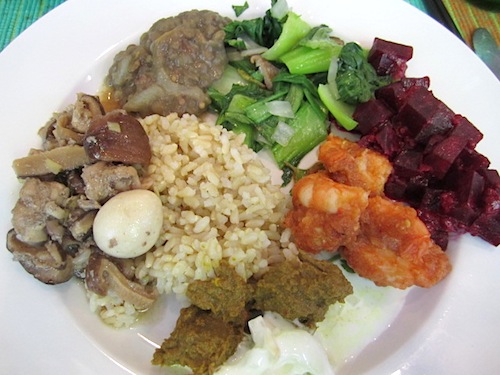 plate We also had a side dish of spicy lentils, seen at the top of this plate. And white and brown rice, of course.