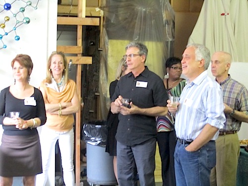 listening The vistors included folks from the Museum of Art's board and staff as well as tourism officials.