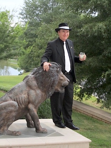 tony-and-lion If any person in Knoxville could tame a lion, it is Tony Spezia!