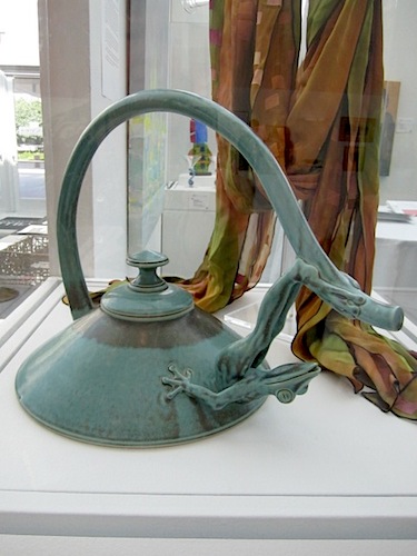 frog-teapot Not every artist is local, though. This frog teapot is by Utah potter Johnny Hughes. His pieces are carried by The District Gallery in Bearden.