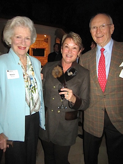 Jenny Boyd, center, with Natalie and Jim Haslam