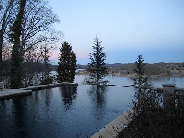 Here's the view from the back porch where the party was held under a tent. Love that infinity pool!