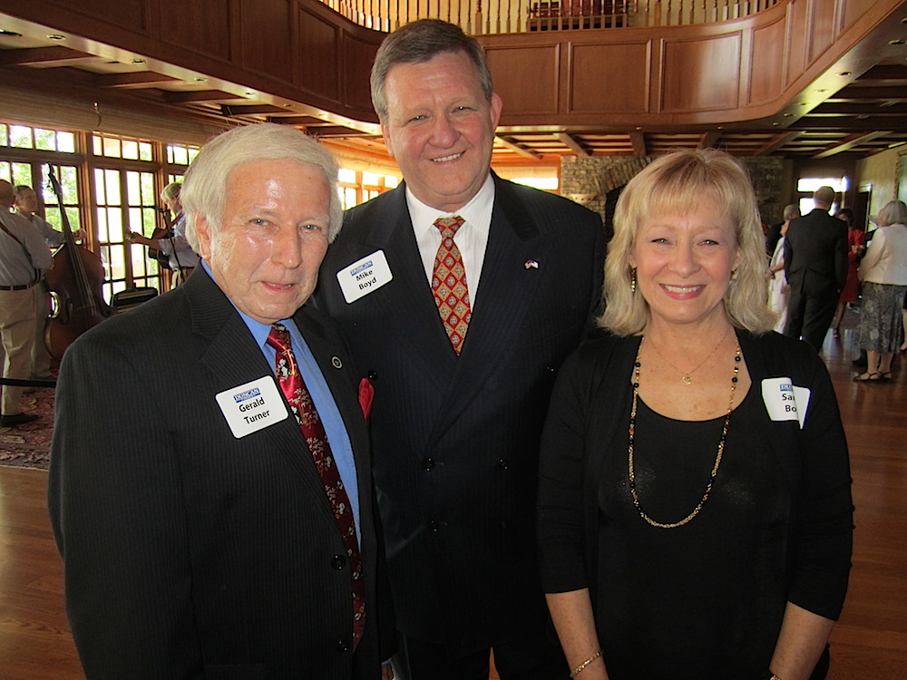 Gerald Turner, left, with Mike and Sandy Boyd.
