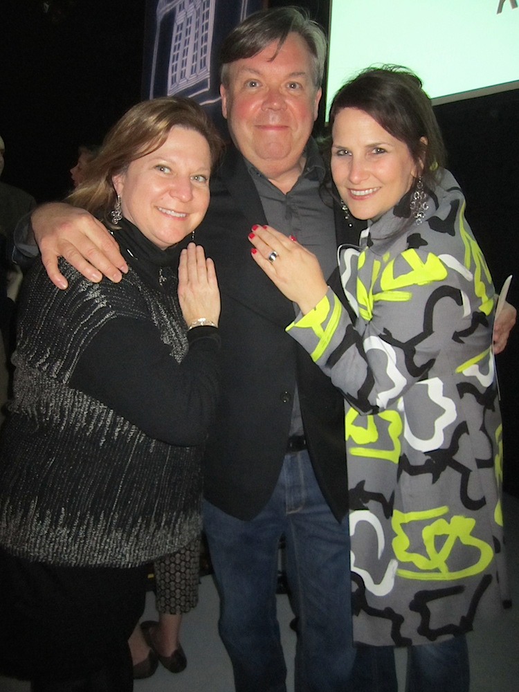 Susan Brown, left, and Janet Testerman Creswell give Mark Grayson some attention.