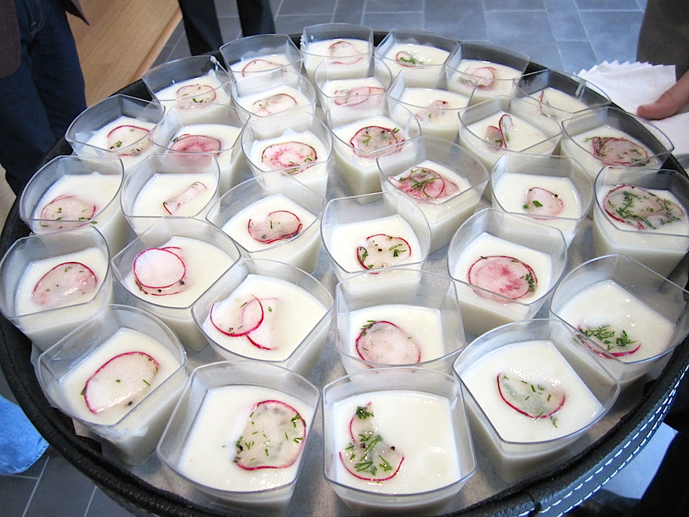 Cream of cauliflower soup garnished with paper thin slices of radishes was another passed appetizer.