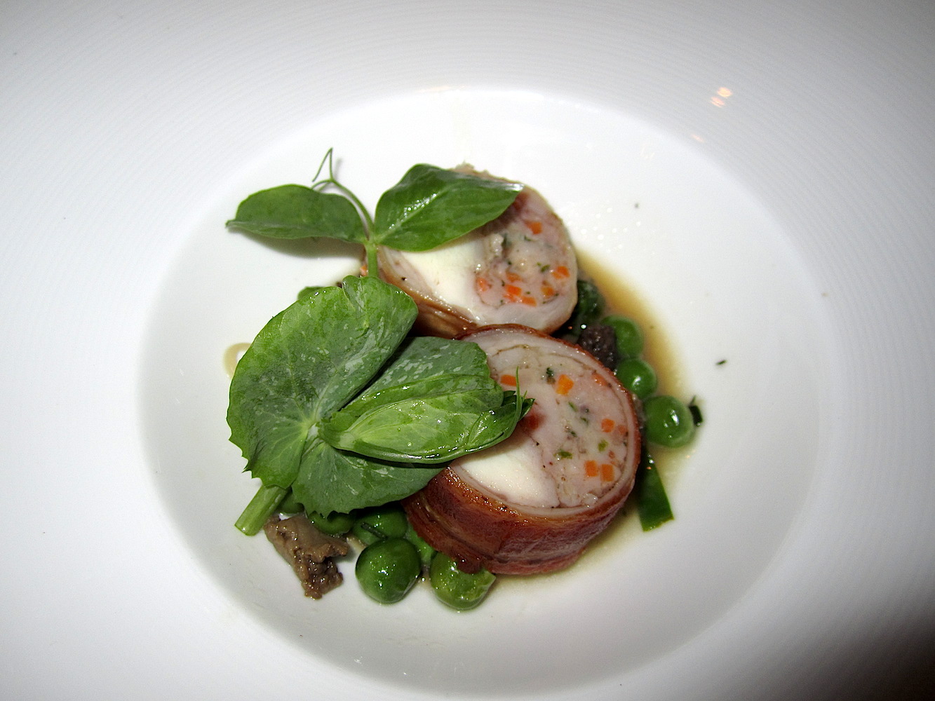In the spirit of being adventurous, I tried this course. Benton's bacon wrapped rabbit with morel mushrooms, peas and ramps. It was delicious, but I just couldn't eat more than a bite. You know, Donald and his friends.