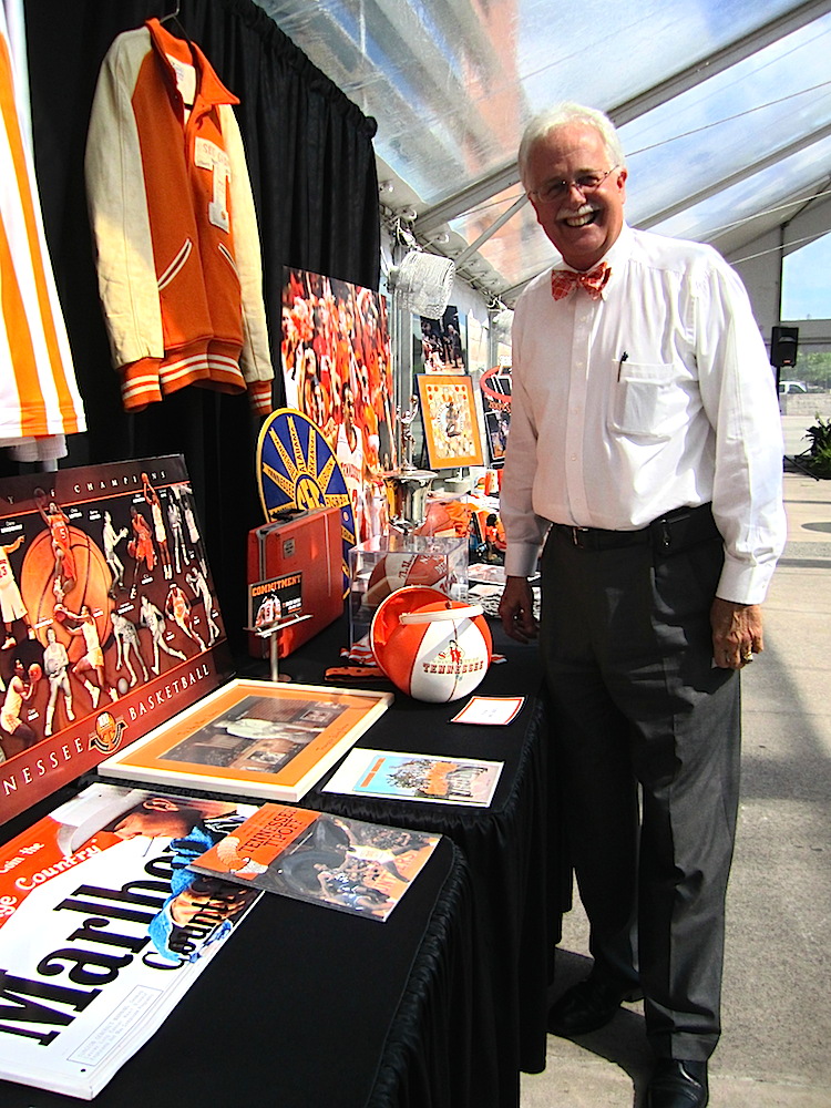 Knox County Commissioner R. Larry Smith with part of his immense collection of UT basketball memorabilia.