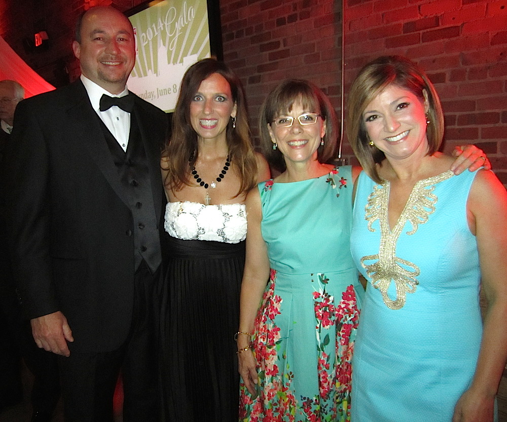 From left, Terry and Regina Turner greet Margie Nichols and Robin Wilhoit. Robin, of WBIR-TV, was the emcee of the evening.