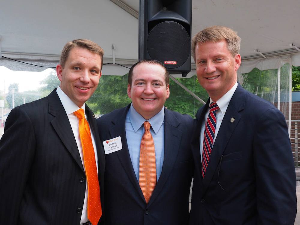Knox County Mayor Tim Burchett, right, and Finance Director Chris Caldwell with Coach Tyndall. (Photo by Gary Heatherly)