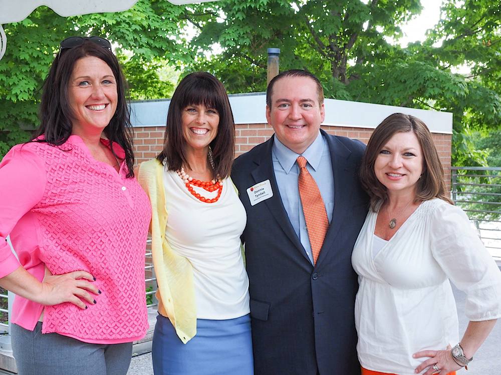 From left, Erin Donovan, Shanna Browning, Coach Tyndall and Angie Wilson. (Photo by Gary Heatherly)