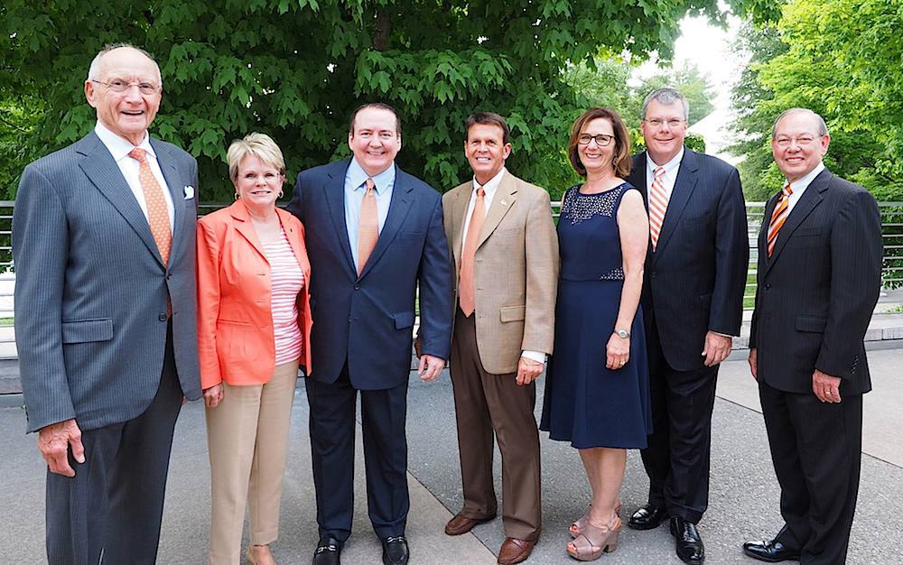 Sponsors posing with the guests on honor. From left, Jim Haslam of Pilot Flying J, Pam Fansler of First Tennessee Bank, Coach Tyndall, UT Athletics Director Dave Hart, Teresa Levey of UT Medical Center, Patrick Birmingham of the News Sentinel and UT Knoxville Chancellor Jimmy Cheek.