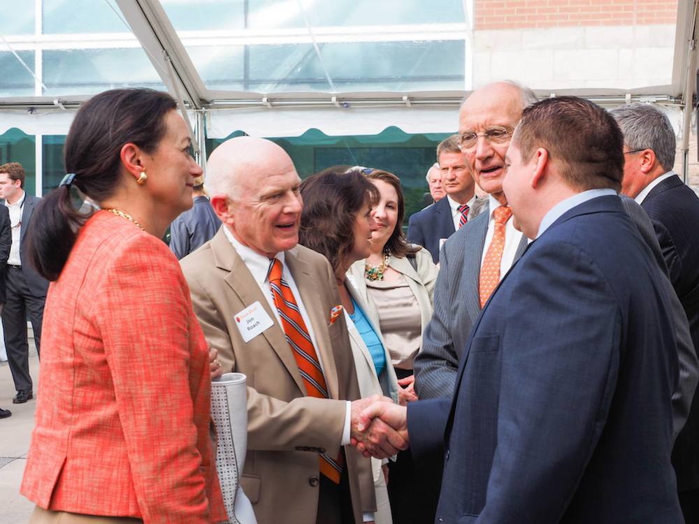Mintha and Jon Roach greet Jim Haslam and Coach Tyndall. (Photo by Gary Heatherly)